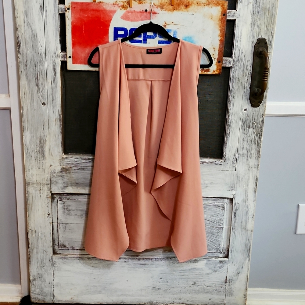 LNC never wore Blush pink vest.